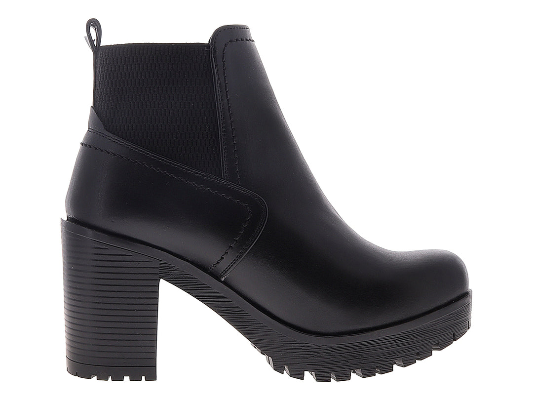 Botines negros para mujer con tacón grueso y suela de plataforma.