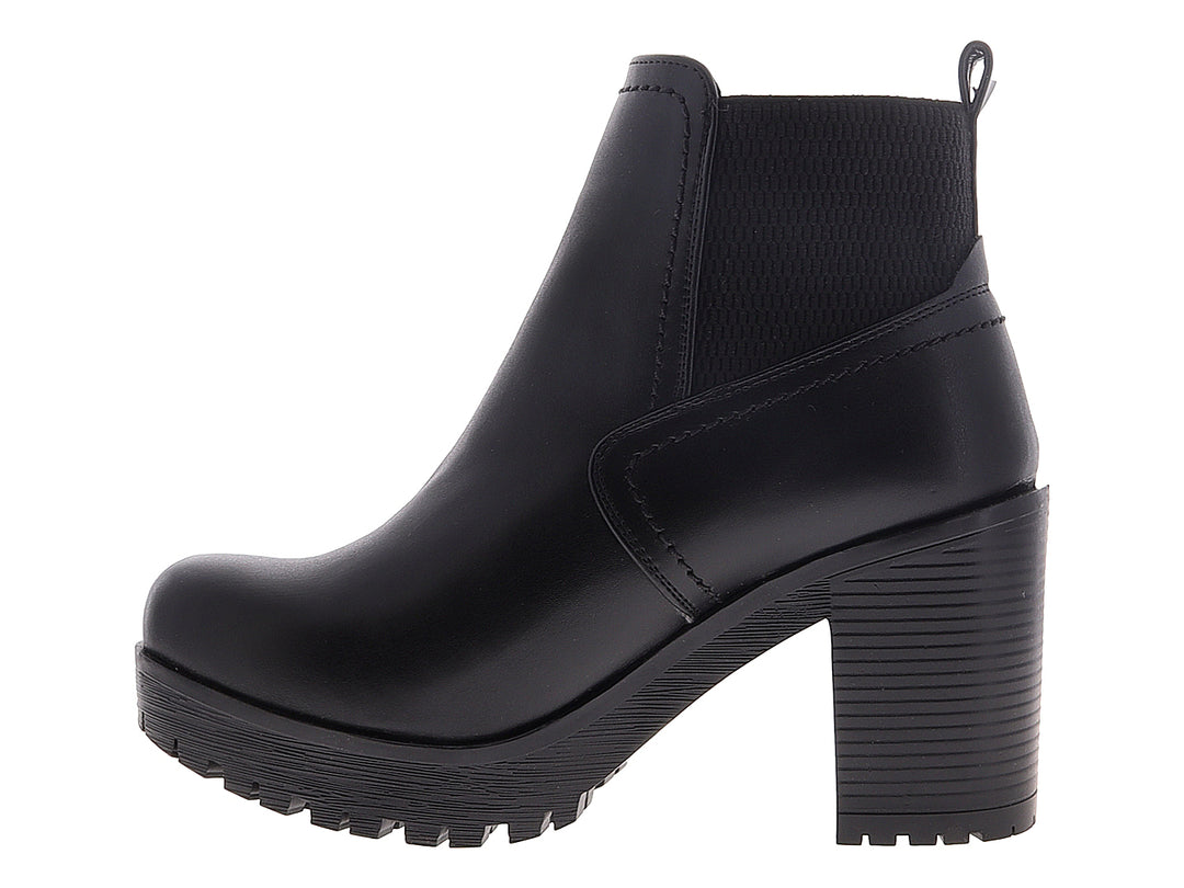 Botines negros para mujer con tacón grueso y suela de plataforma.