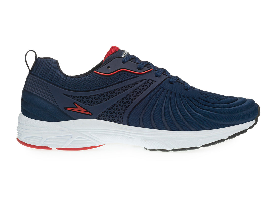 Tenis deportivos para niño en color azul marino con suela blanca y detalles en rojo.