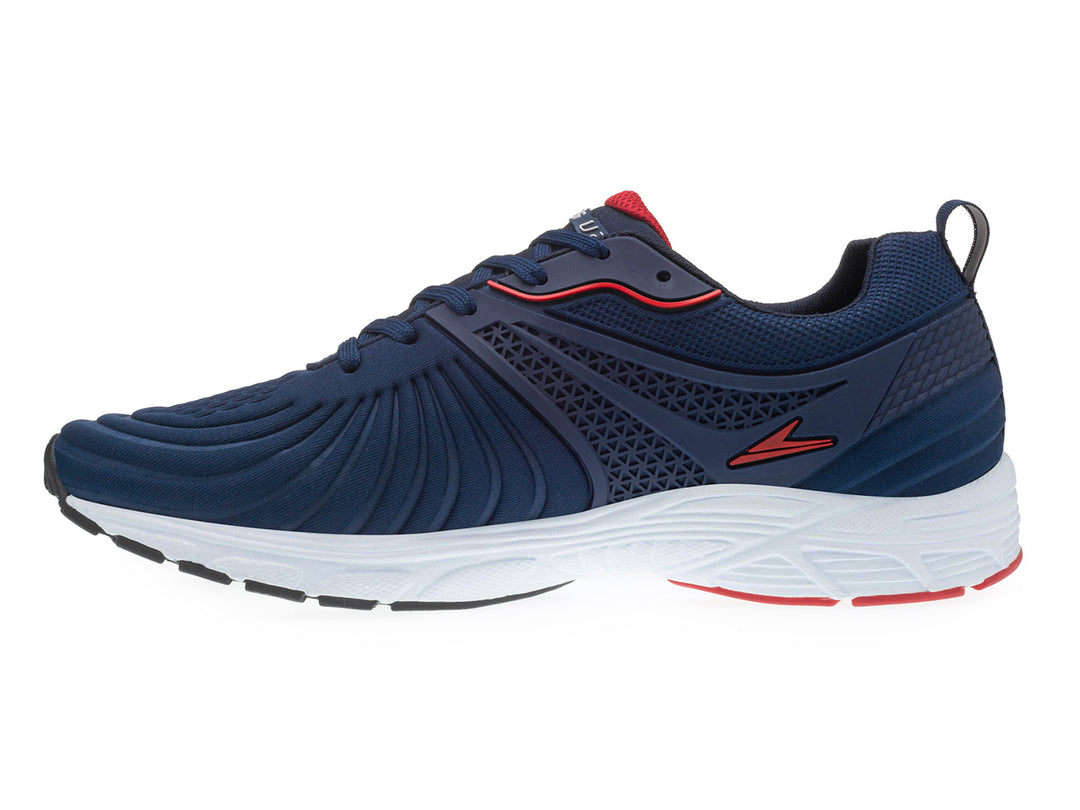 Tenis deportivos para niño en color azul marino con suela blanca y detalles en rojo.
