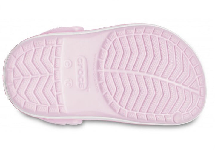 Zuecos Crocs Crocband para niña en color rosa con detalles y suela en color blanco.