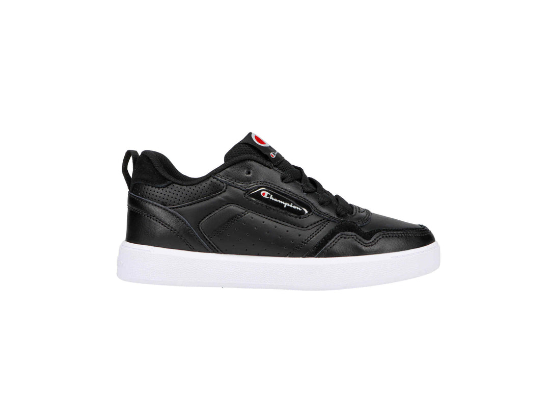 Tenis Champion Lore para niño en color negro con suela blanca.