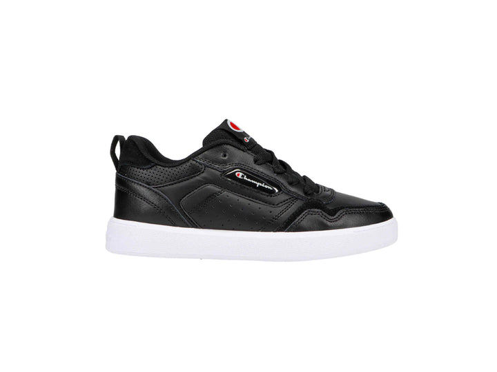 Tenis Champion Lore para niño en color negro con suela blanca.