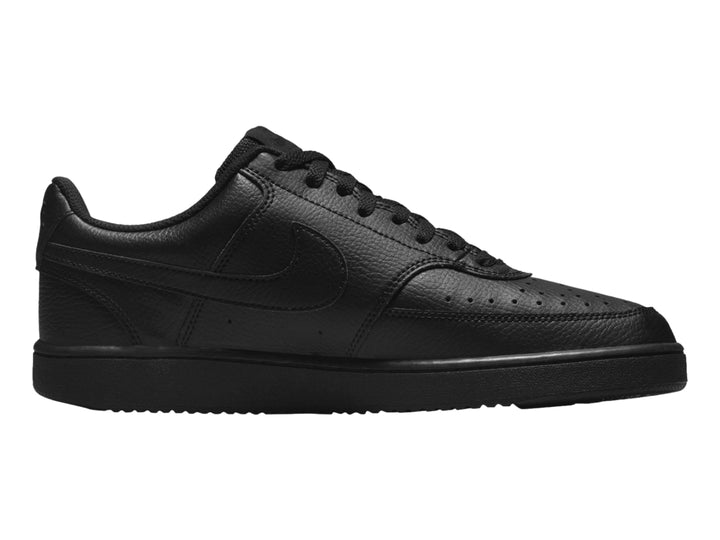 Par de tenis Nike Court Vision Low en color negro sólido, vista lateral.