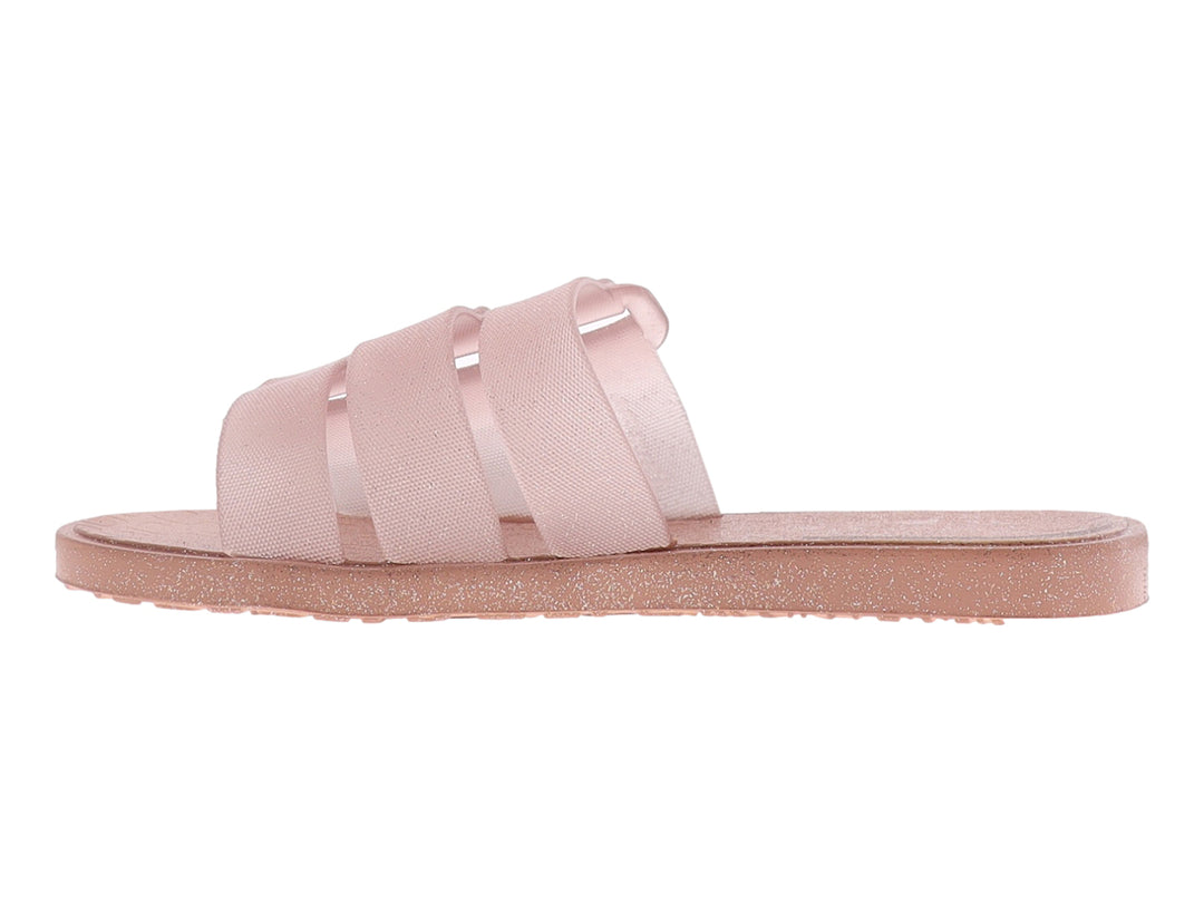 Sandalia plana Ipanema color rosa claro con correas anchas entrelazadas y suela con detalles brillantes.