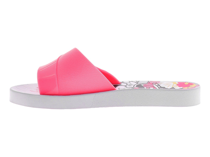 Sandalias Ipanema para niña color rosa con suela blanca y detalles coloridos.
