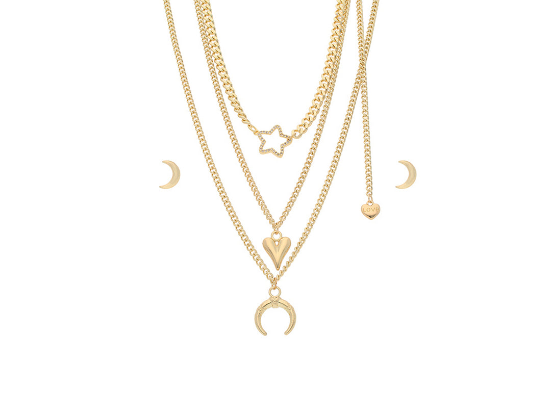 Set de collares en capas de color oro con dijes de estrella, corazón y luna.