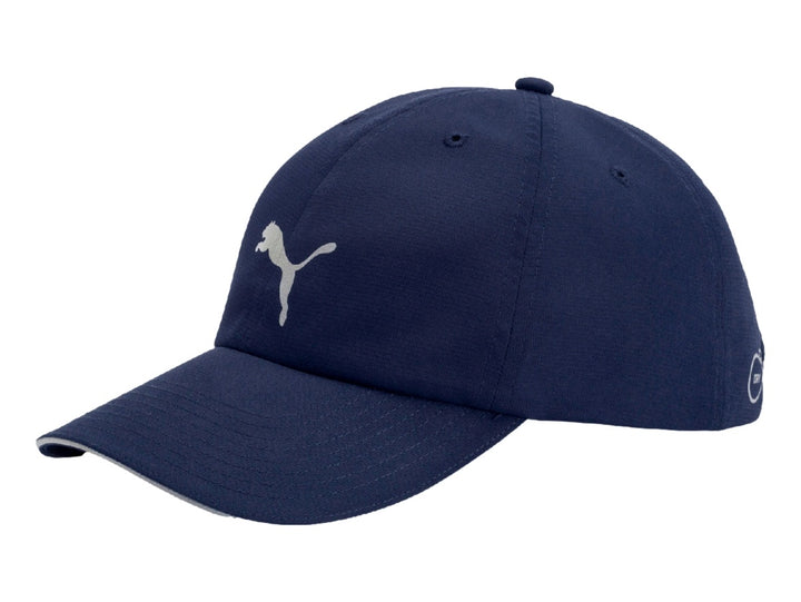 Gorra deportiva PUMA color azul marino con logotipo plateado y visera curva.