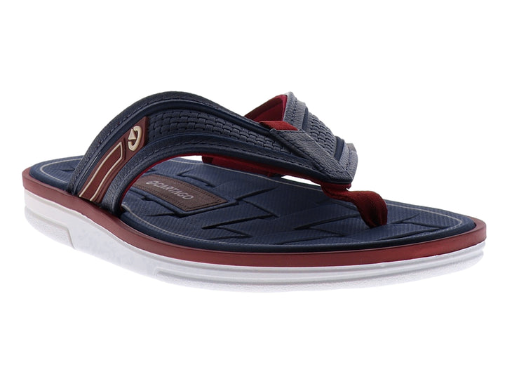 Sandalias Cartago color azul marino con suela blanca y detalles en rojo.