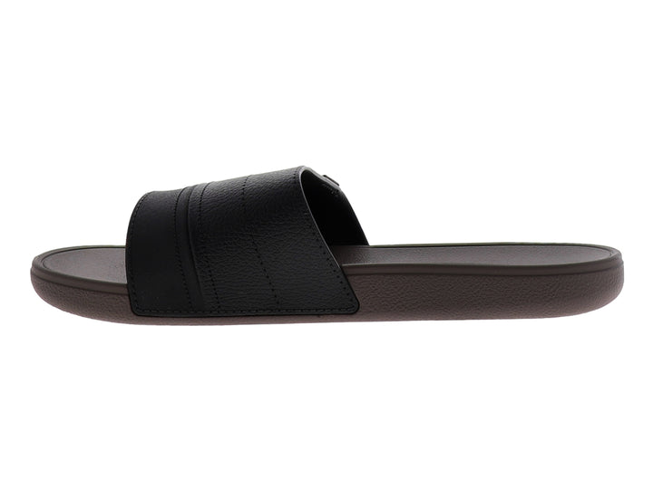 Sandalia Cartago para hombre en colores negro y marrón con banda ancha texturizada.
