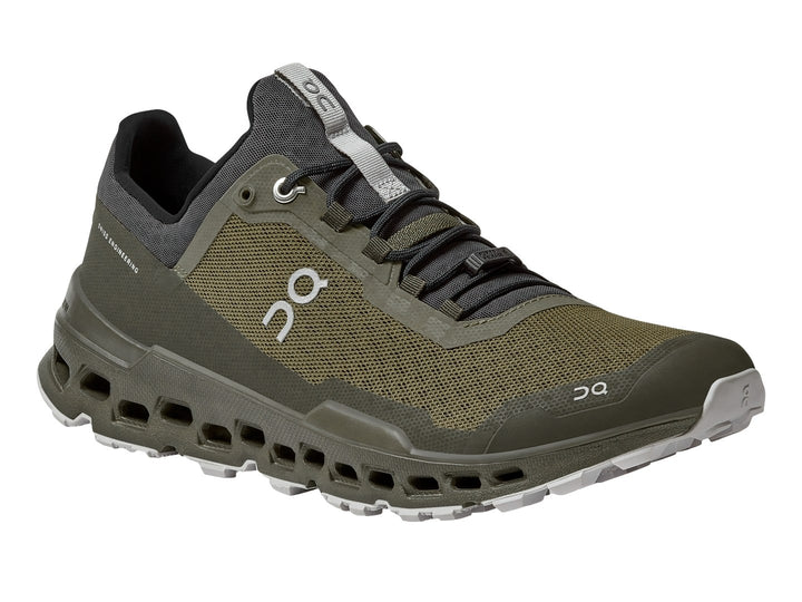 Tenis deportivos On Cloud Ultra color oliva y gris oscuro con suela para trail.