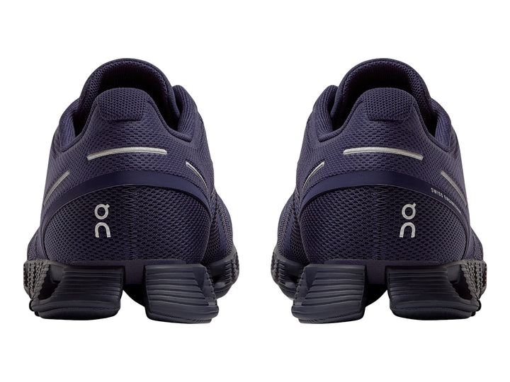 Tenis deportivos On Cloud color morado acai con suela amortiguada y tejido de malla.