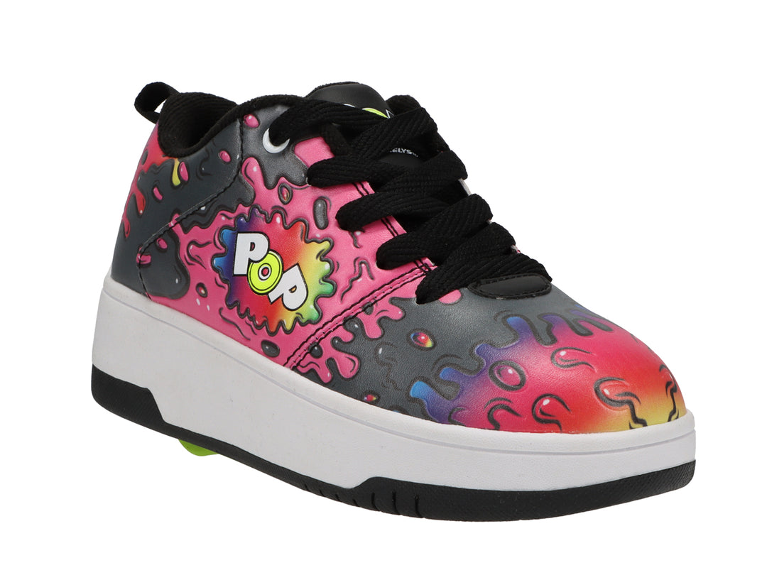 Tenis patín Heelys para niña con diseño multicolor splatter, suela blanca y negra.