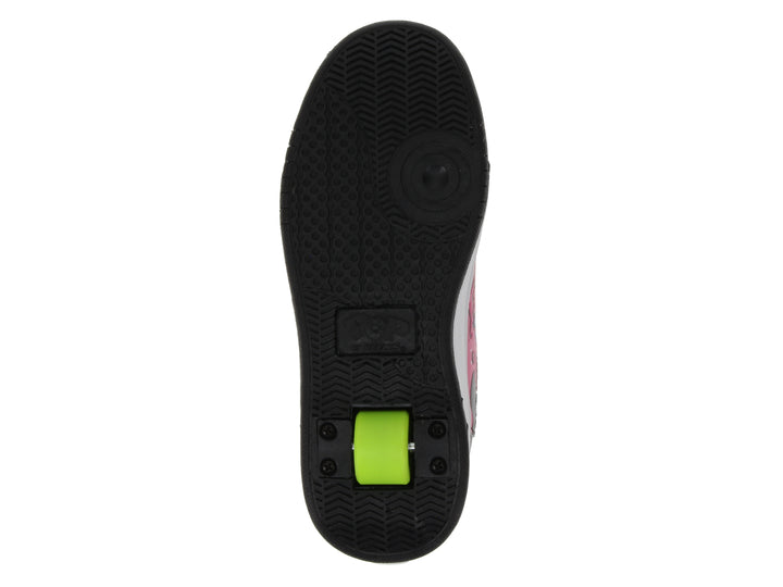 Tenis patín Heelys para niña con diseño multicolor splatter, suela blanca y negra.