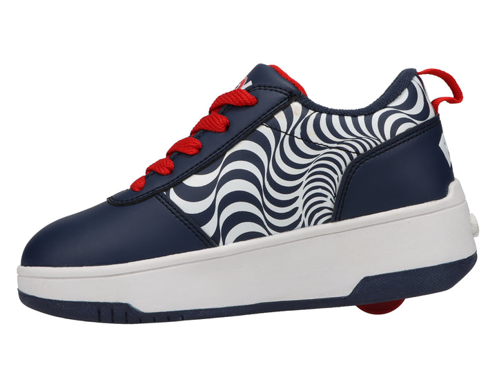 Tenis Heelys color azul marino con detalles en blanco y rojo, diseño gráfico lateral y suela blanca gruesa.