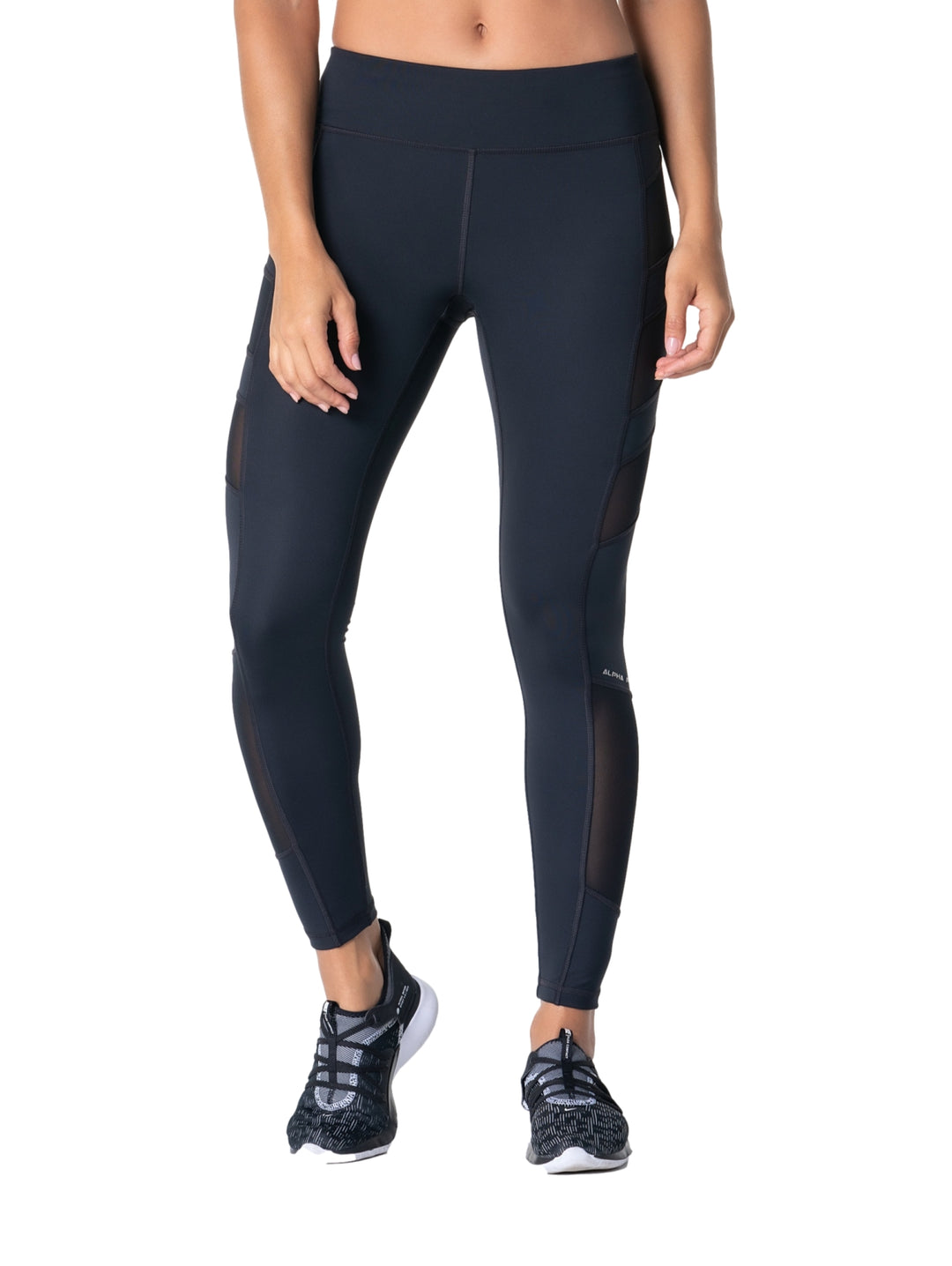 Leggings deportivos color negro con paneles laterales de malla translúcida para mujer.