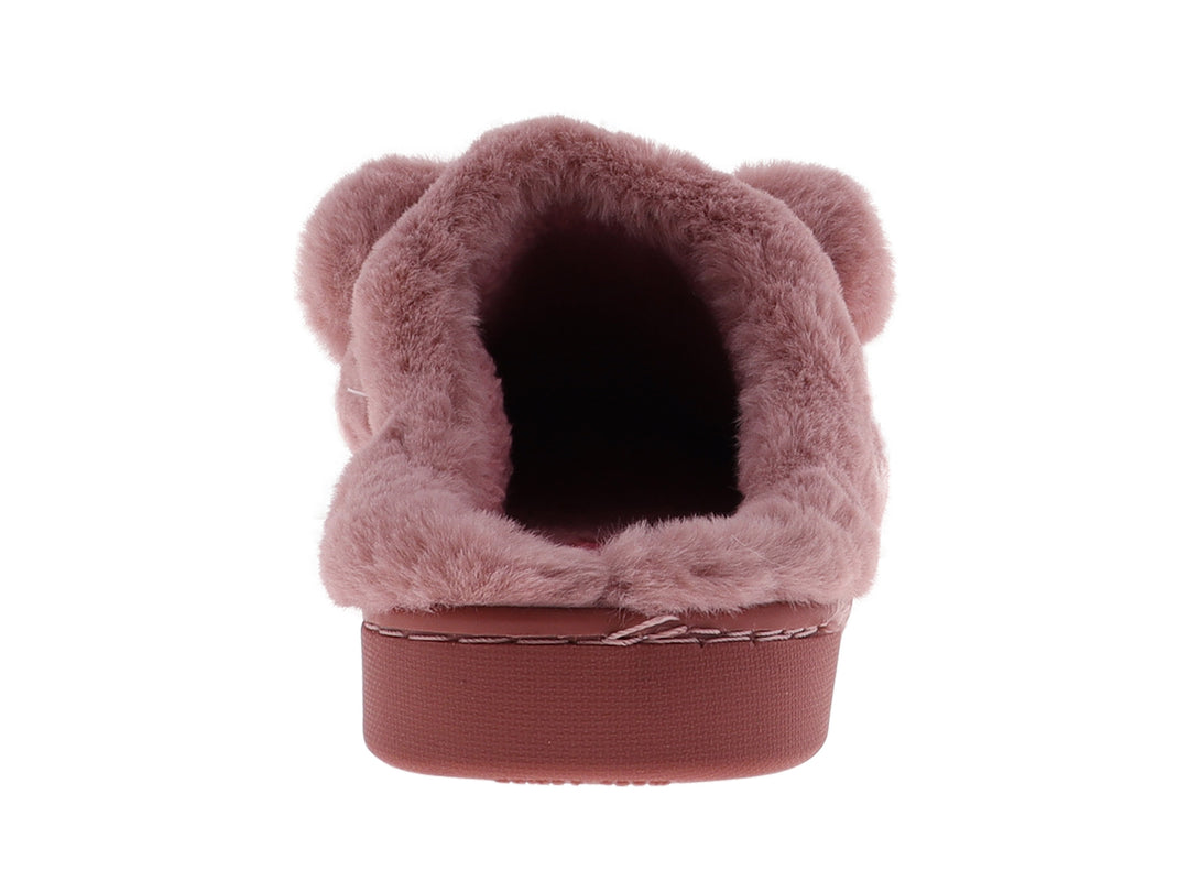 Pantufla rosa de textura peluda con pompones decorativos.