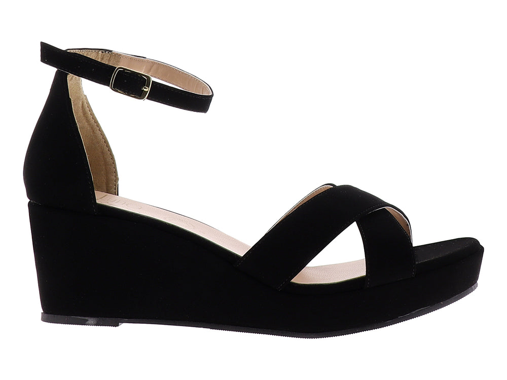 Sandalia de plataforma color negro con tiras cruzadas y correa ajustable al tobillo para mujer.