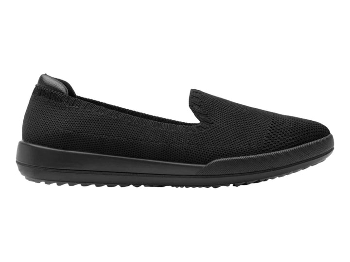 Zapato plano Flexi color negro en material textil tejido, diseño casual y cómodo.