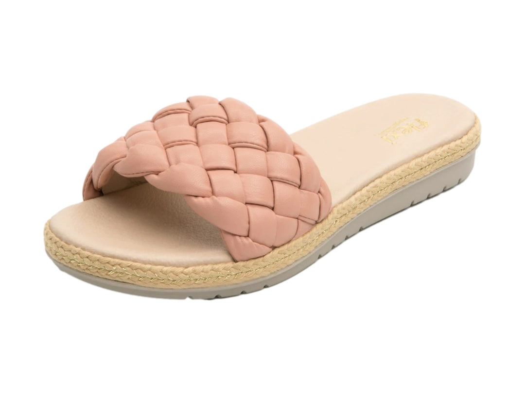 Sandalia Flexi color rosa con correa trenzada y suela de estilo espadrille.