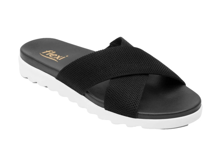 Sandalias Flexi negras de textil con correas cruzadas y suela blanca contrastante.