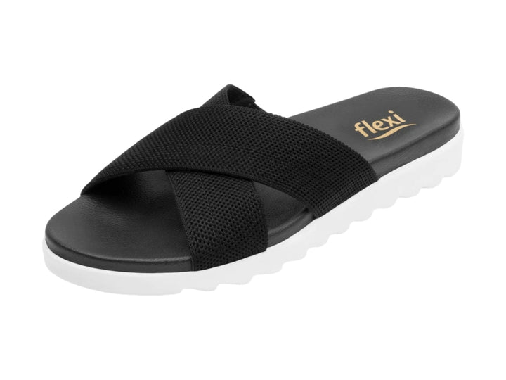 Sandalias Flexi negras de textil con correas cruzadas y suela blanca contrastante.
