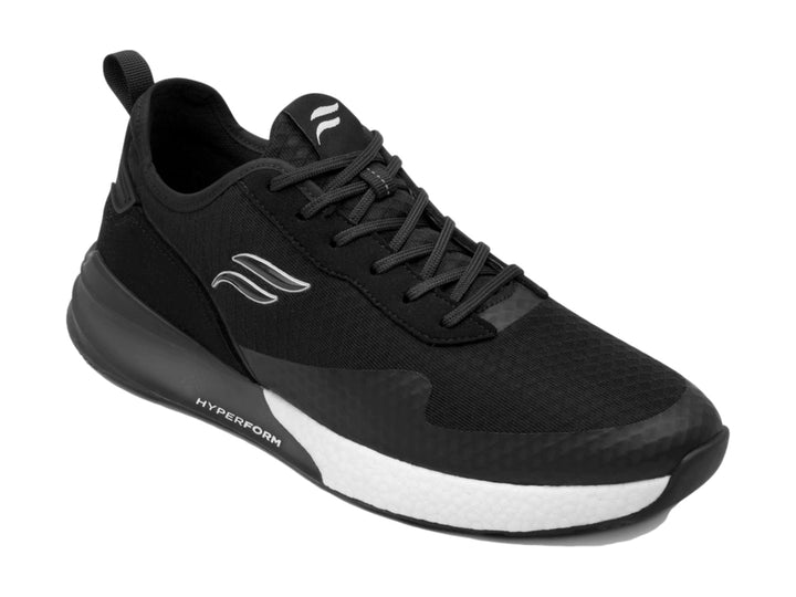 Tenis deportivos Flexi color negro con suela blanca y tejido de malla.