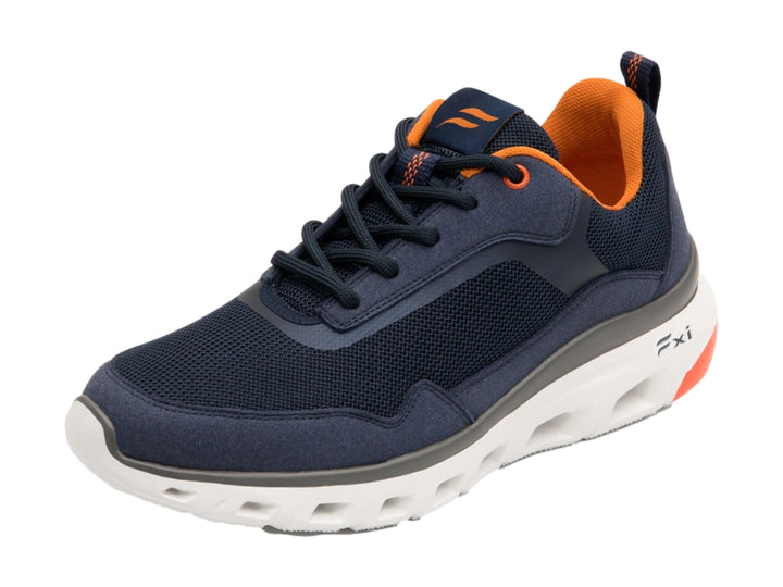 Tenis deportivos Flexi en color azul marino con suela blanca y detalles en naranja.