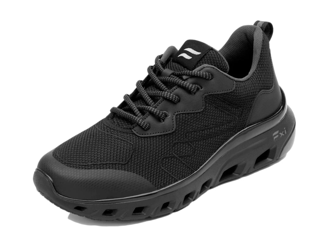 Tenis Flexi color negro con malla transpirable y suela gruesa deportiva.