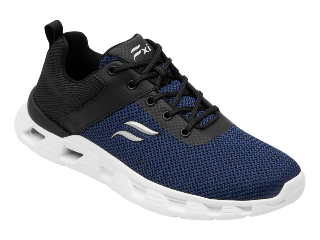 Tenis deportivos Flexi en color azul y negro con suela blanca gruesa y textura de malla.