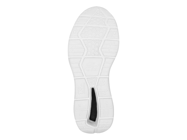 Tenis deportivos Flexi en color azul y negro con suela blanca gruesa y textura de malla.