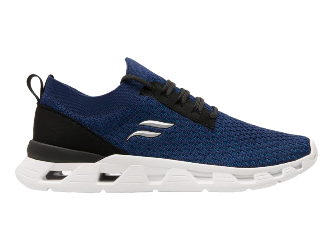 Tenis deportivos Flexi color azul con suela blanca y detalles en negro.