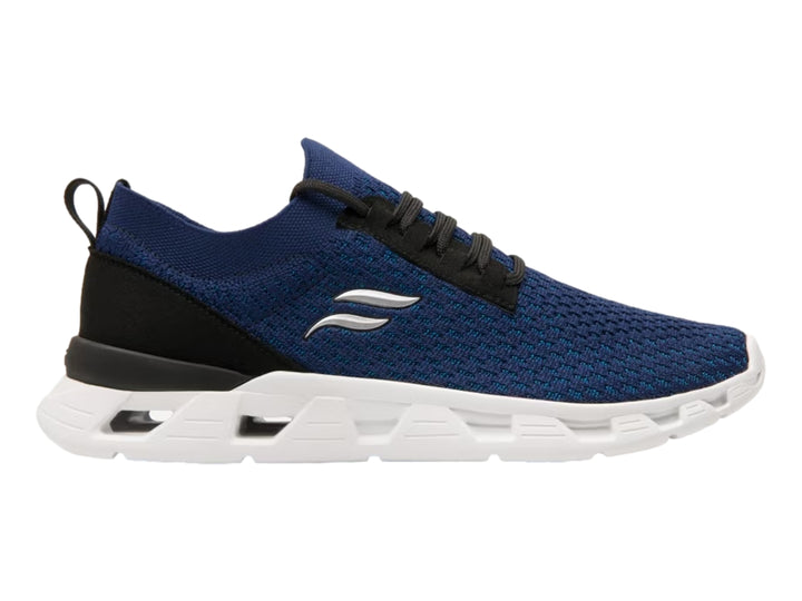 Tenis deportivos Flexi color azul con suela blanca y detalles en negro.