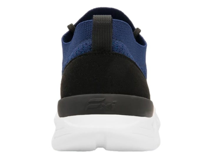 Tenis deportivos Flexi color azul con suela blanca y detalles en negro.