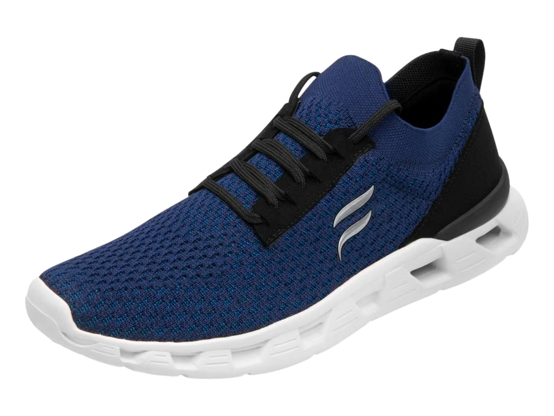 Tenis deportivos Flexi color azul con suela blanca y detalles en negro.