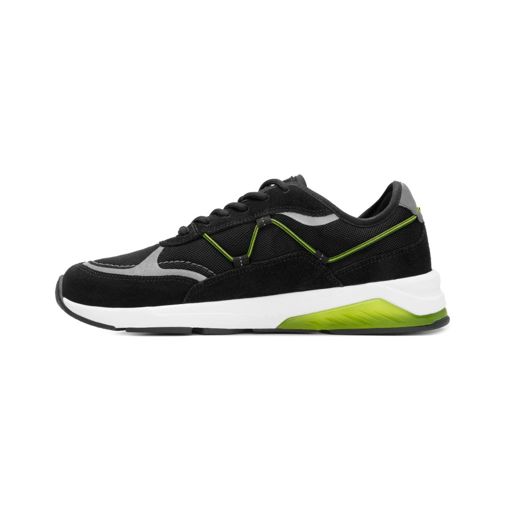 Tenis deportivos Flexi color negro con detalles en verde lima y suela blanca.
