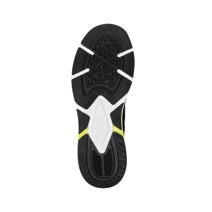 Tenis deportivos Flexi color negro con detalles en verde lima y suela blanca.