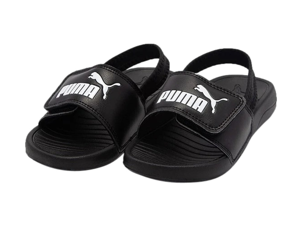 Sandalia Puma Popcat 20 negra para niño con correa posterior y logotipo blanco.