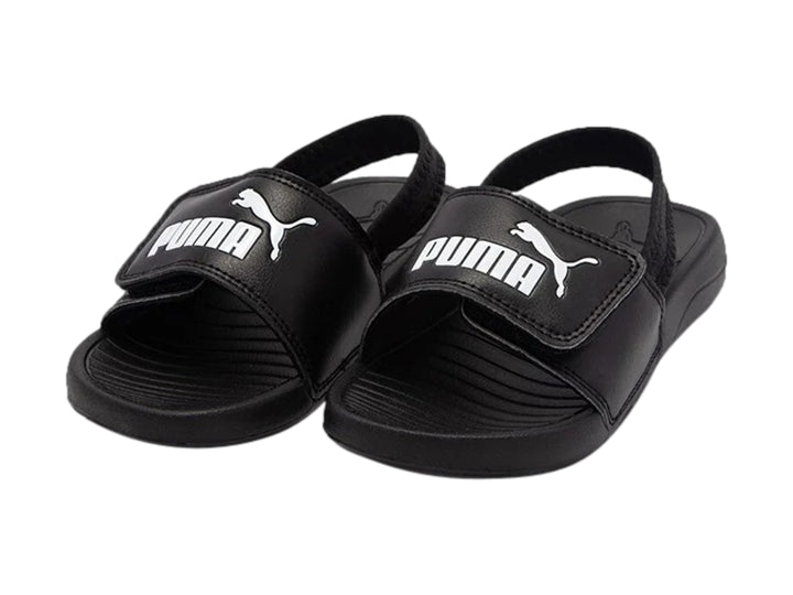 Sandalia Puma Popcat 20 negra para niño con correa posterior y logotipo blanco.