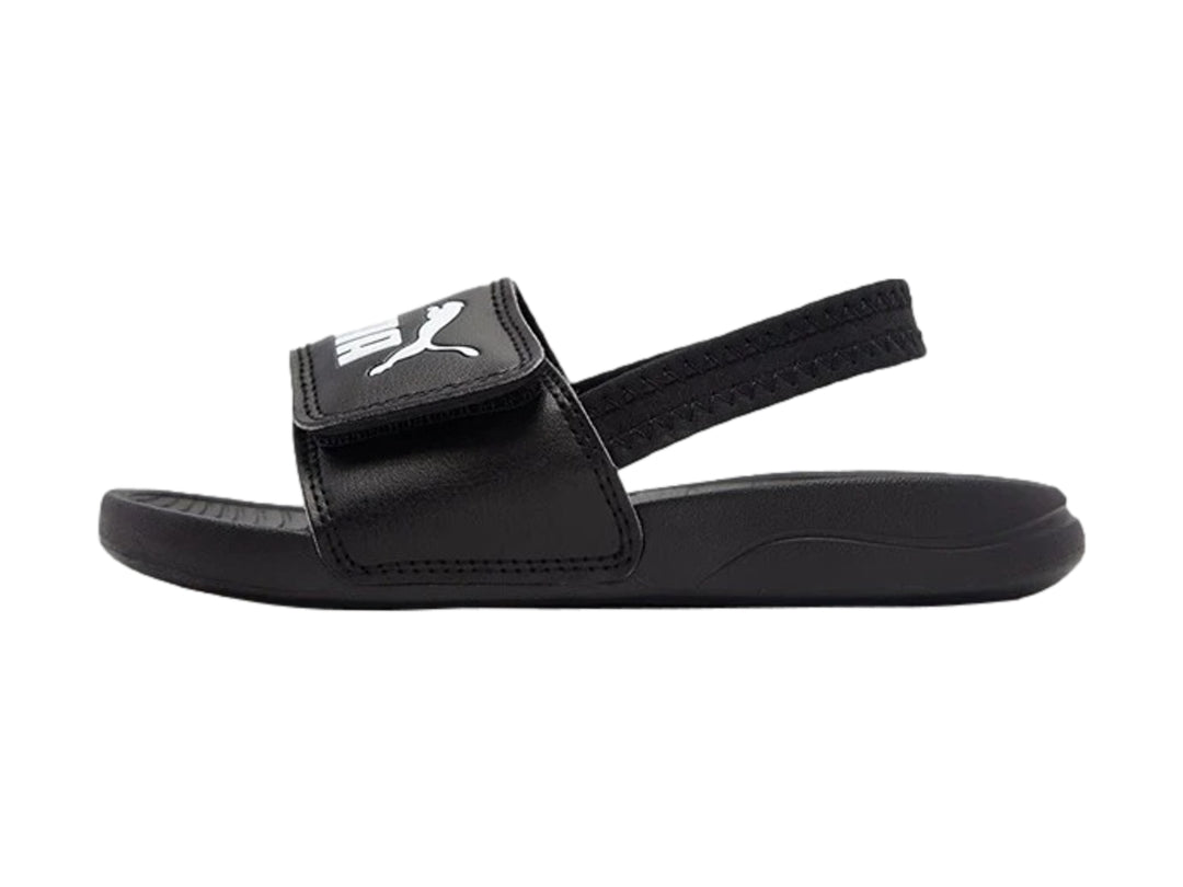 Sandalia Puma Popcat 20 negra para niño con correa posterior y logotipo blanco.