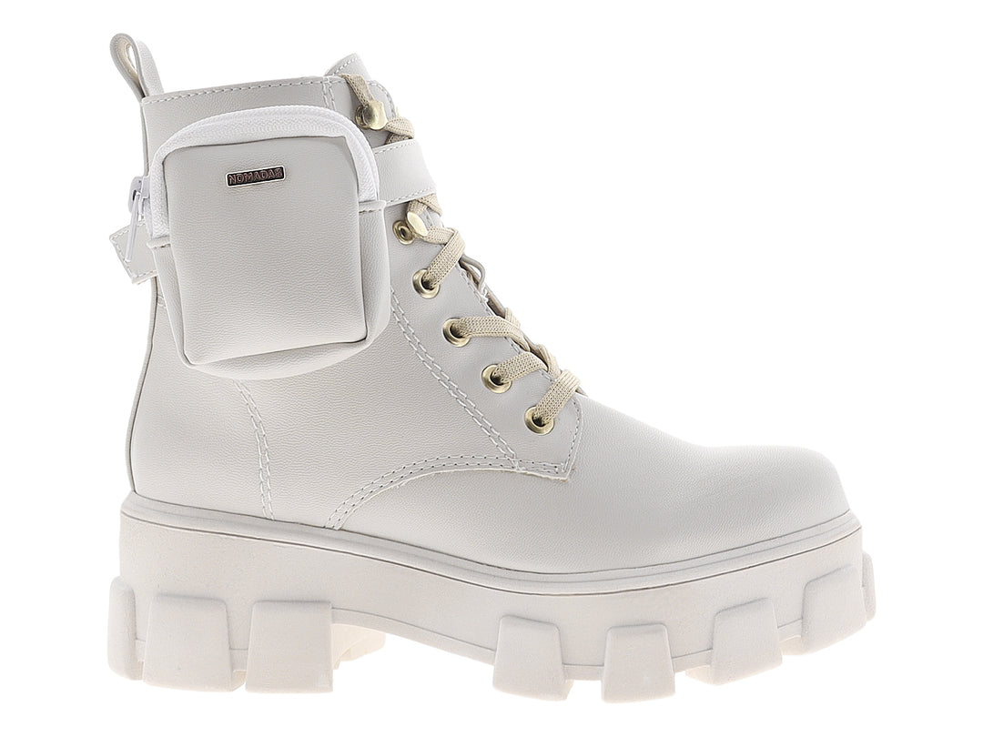 Botines Nomadas color gris claro para mujer con suela de plataforma gruesa y pequeño bolsillo lateral.