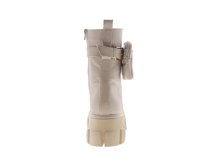 Botín beige para mujer de la marca NOMADAS con suela de plataforma gruesa y pequeño bolsillo lateral.