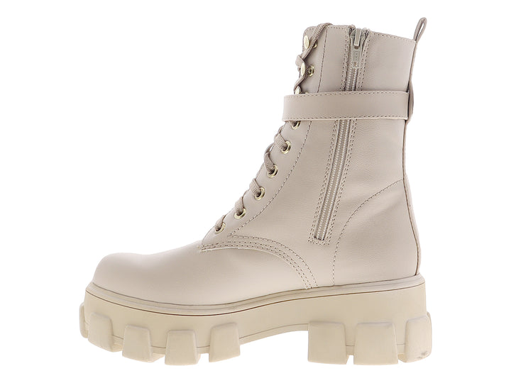 Botín beige para mujer de la marca NOMADAS con suela de plataforma gruesa y pequeño bolsillo lateral.