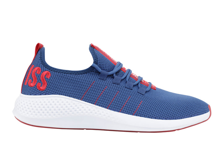 Tenis deportivos K-Swiss color azul marino con suela blanca y detalles en rojo.