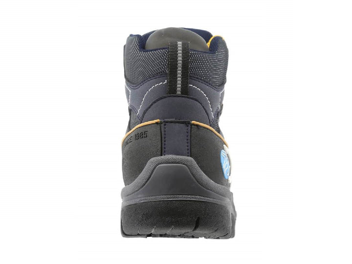 Botas Discovery color marino con suela negra y agujetas amarillas para hombre.