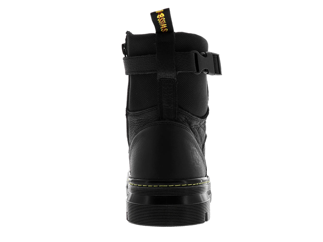Bota negra de caña alta con suela track, cordones y correa ajustable en el tobillo.