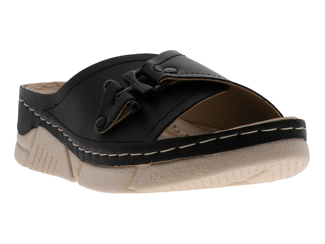 Sandalias negras para mujer con suela beige y costuras blancas decorativas.