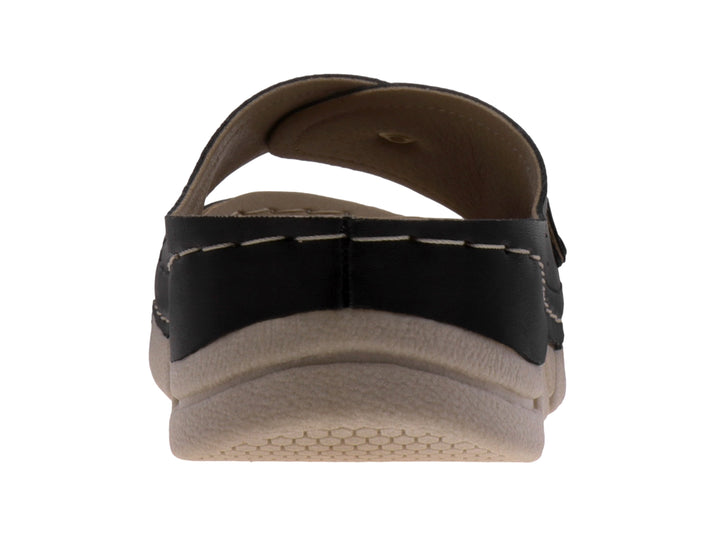 Sandalias negras para mujer con suela beige y costuras blancas decorativas.