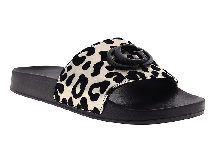 Sandalias deslizables GUESS con estampado de leopardo en blanco y negro y logo circular en la parte superior.