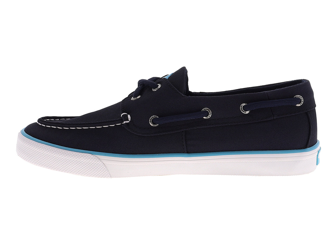 Zapato náutico Sperry de color azul marino con suela blanca y un detalle en azul claro.